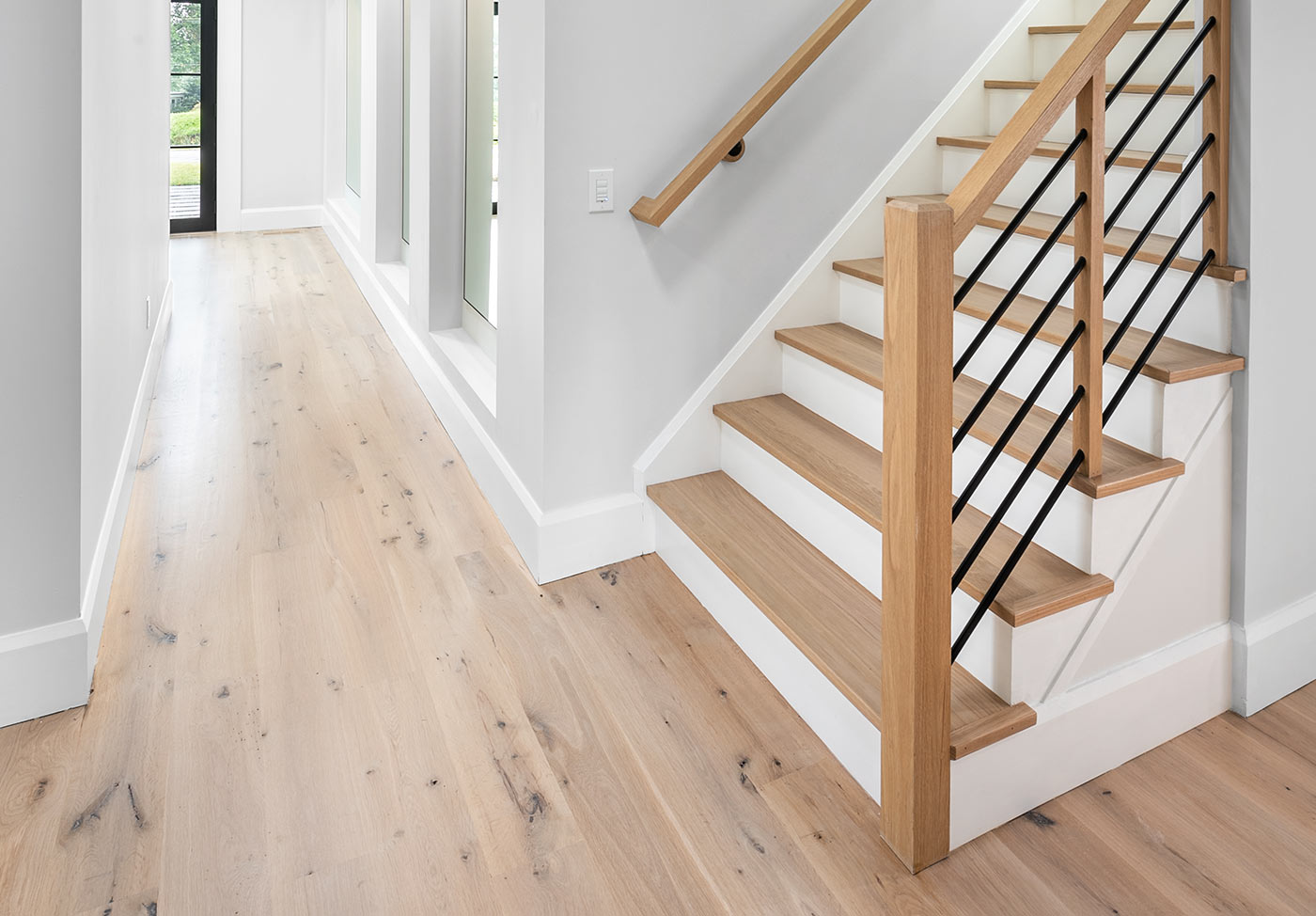 Fine hardwood floors and stair parts for an elegant look.