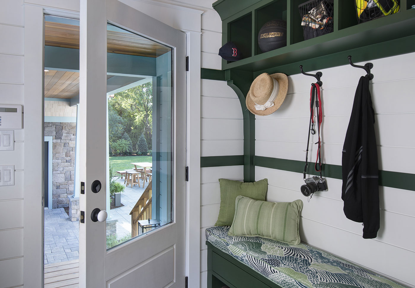 Mudroom with built-in cubbies.