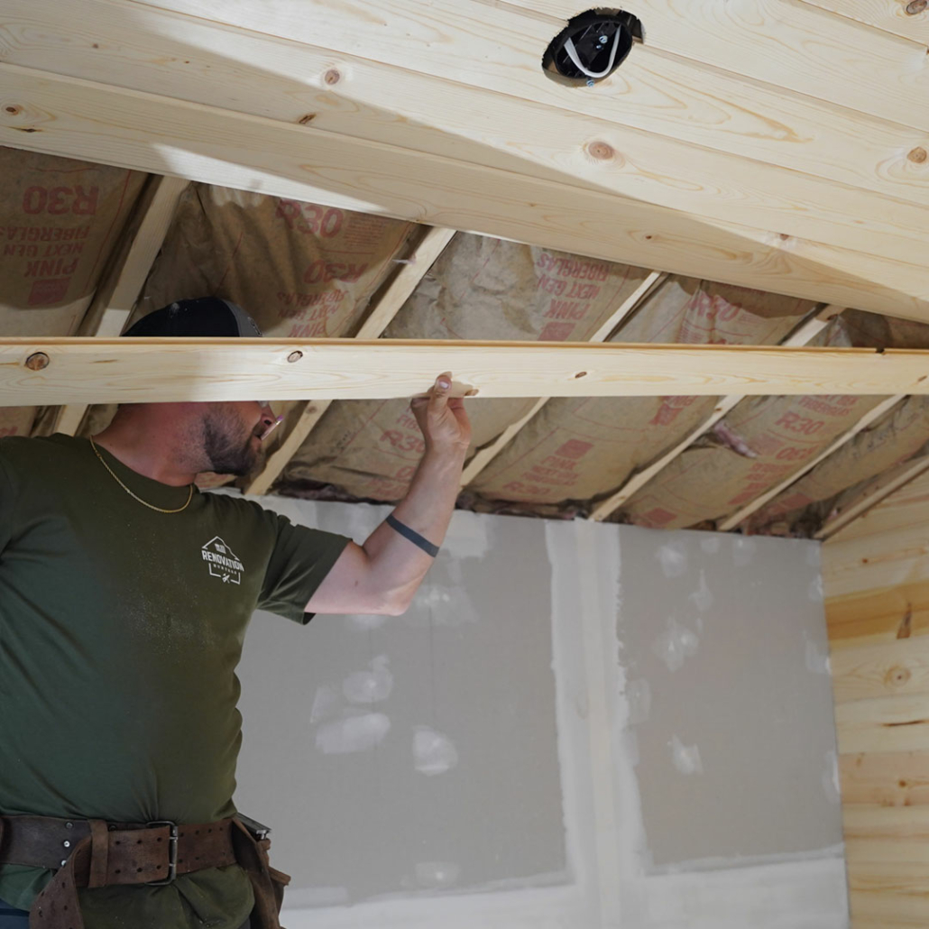 Installing a wood ceiling in a tiny home for Renovation Hunters’ Project Baldwin.